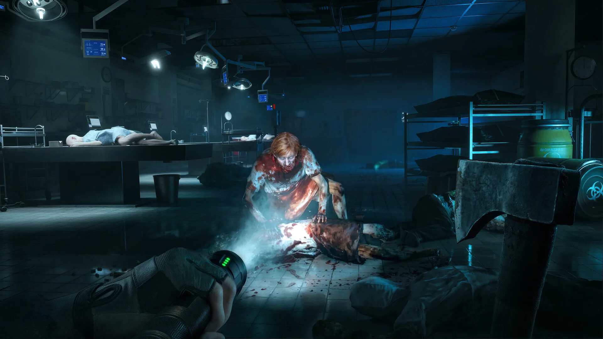 An infected zombie in a blue-lit medical room in No More Room in Hell 2